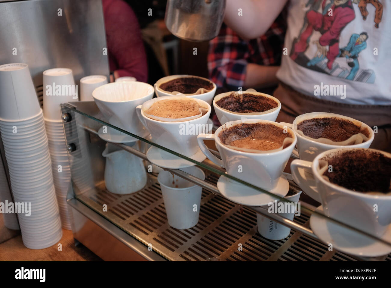 Barista preparing coffee in artisan coffee shop,London,England Stock Photo