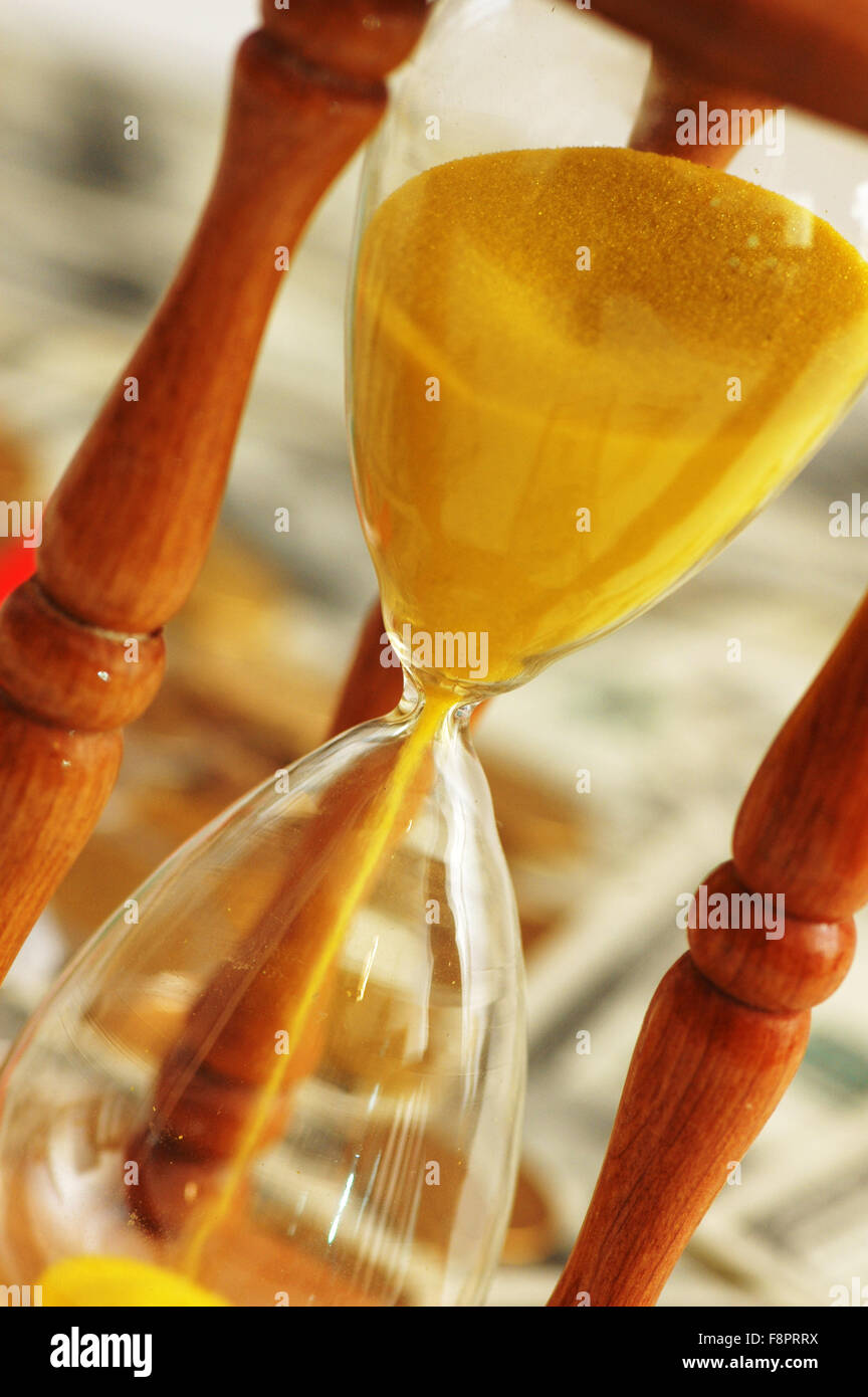 Time concept - Diagonal close up of hourglasses Stock Photo - Alamy