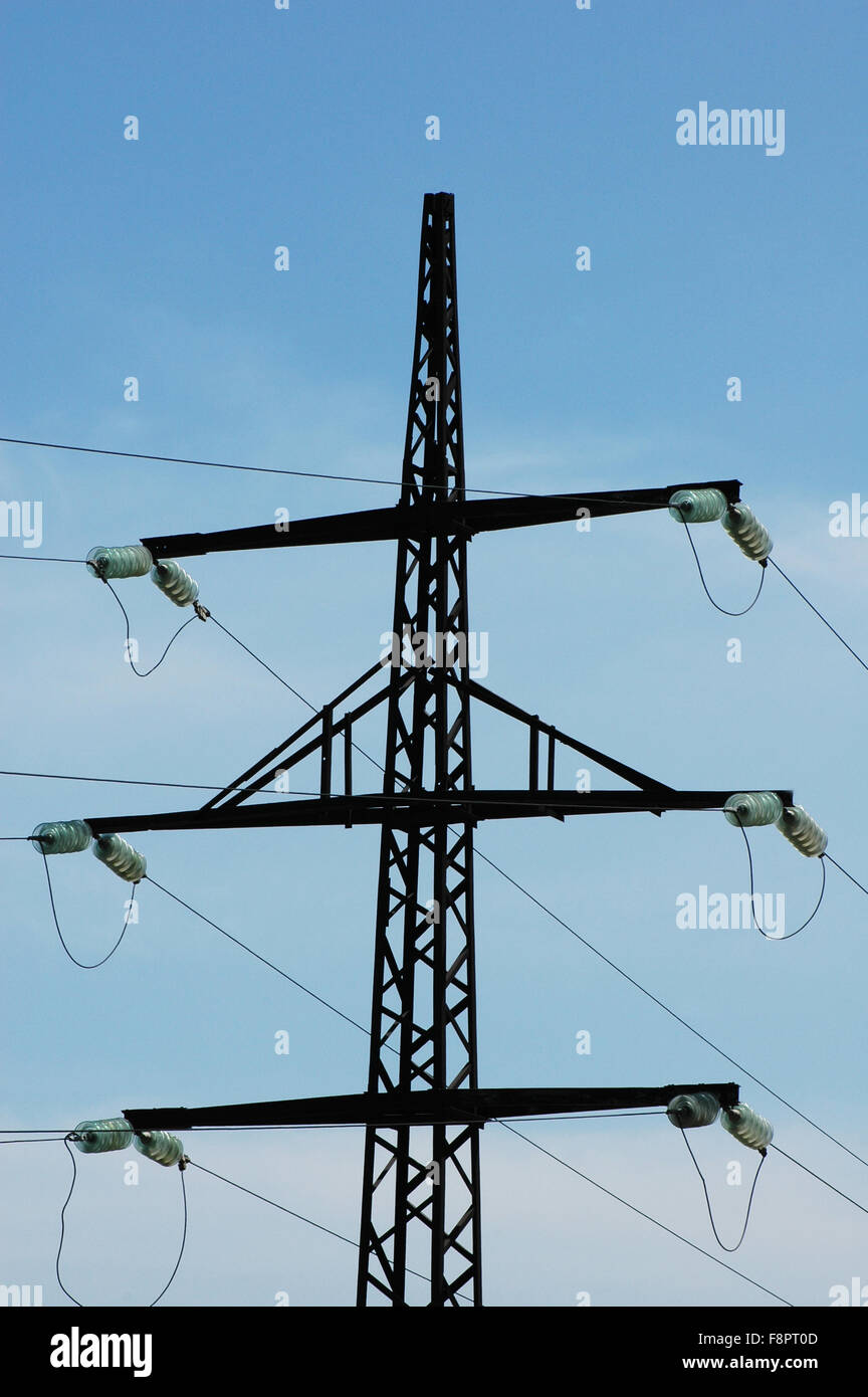 Silhouette of power line against bright blue sky Stock Photo - Alamy