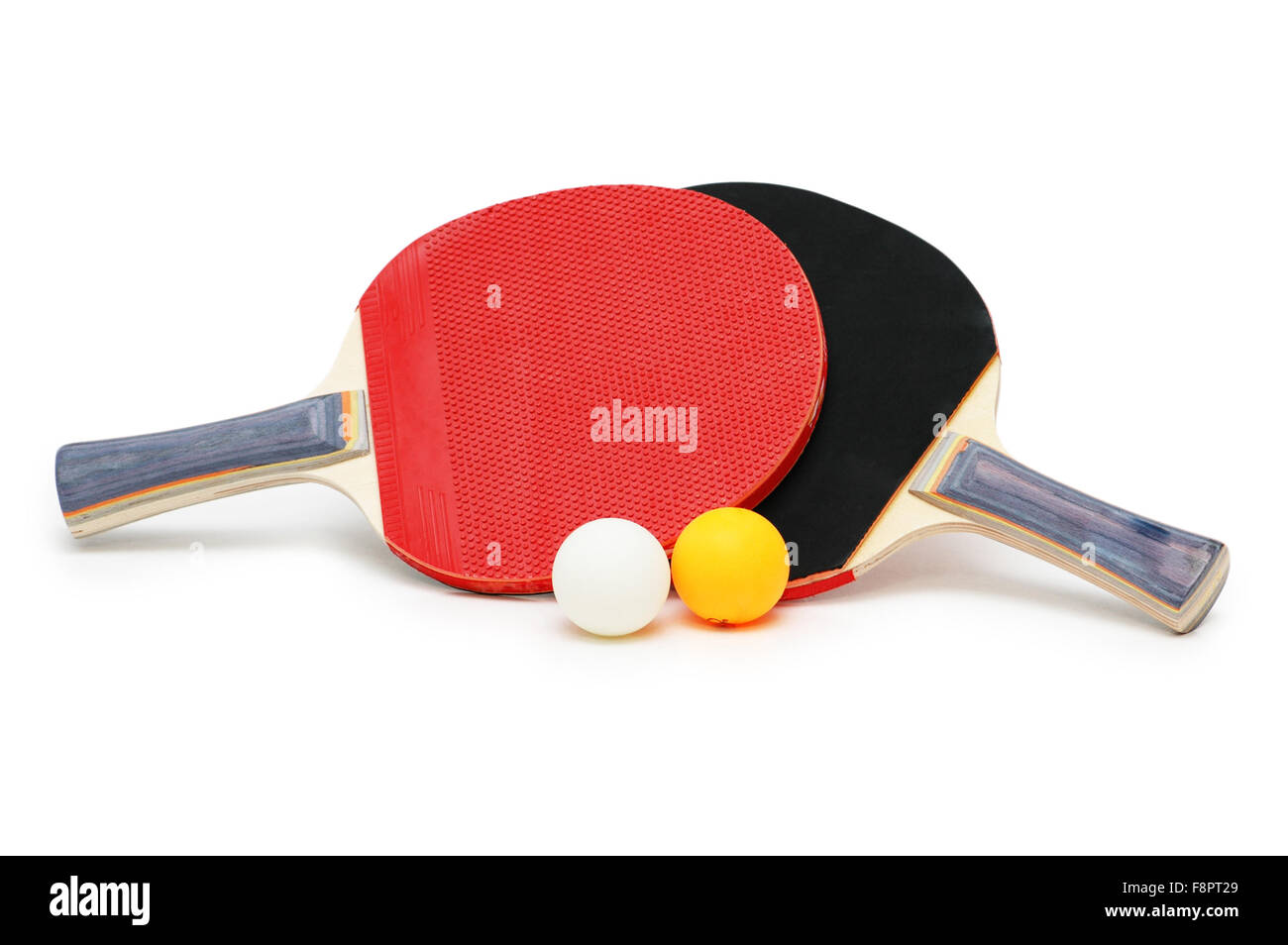 Two tennis rackets and balls isolated on white Stock Photo - Alamy