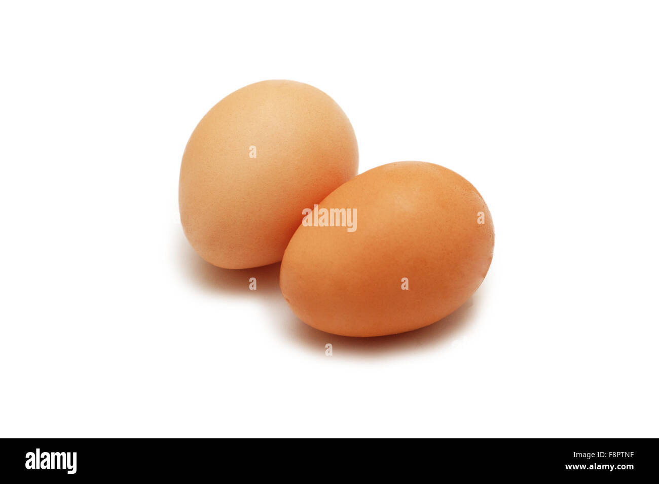 Two eggs isolated on the white background Stock Photo - Alamy