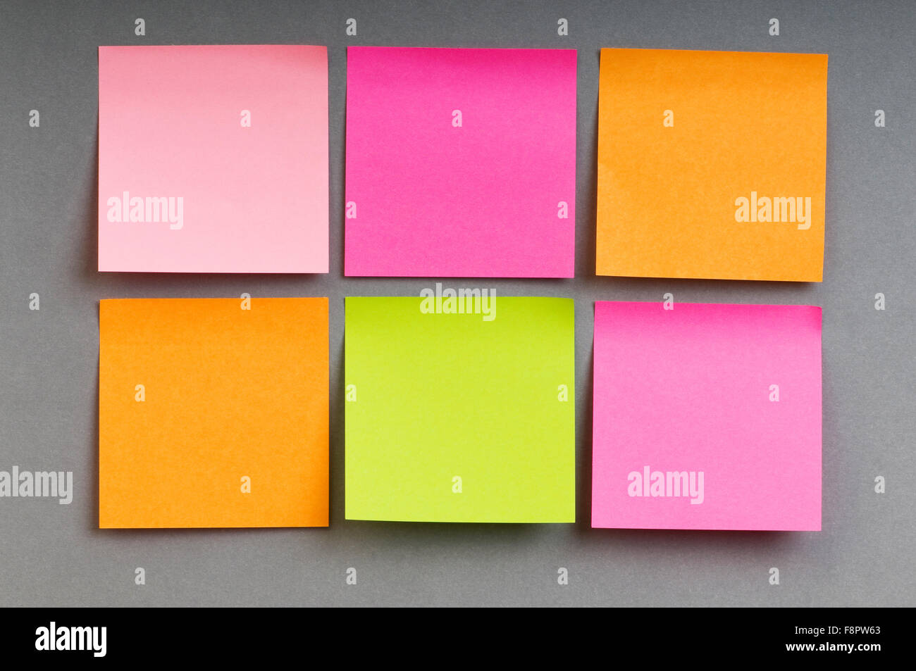 Reminder notes on the bright colorful paper Stock Photo - Alamy