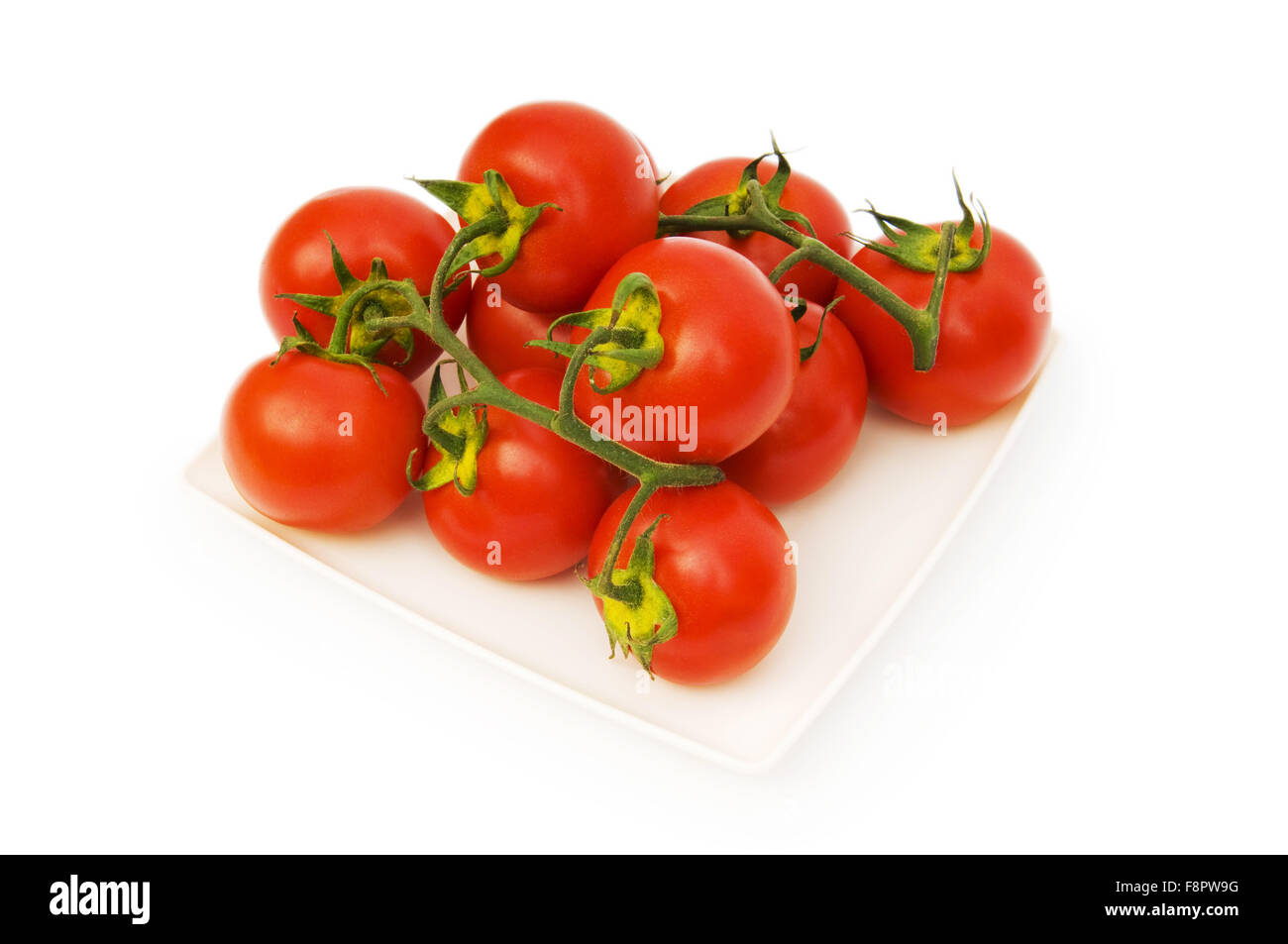 Red tomatoes isolated on the white background Stock Photo - Alamy