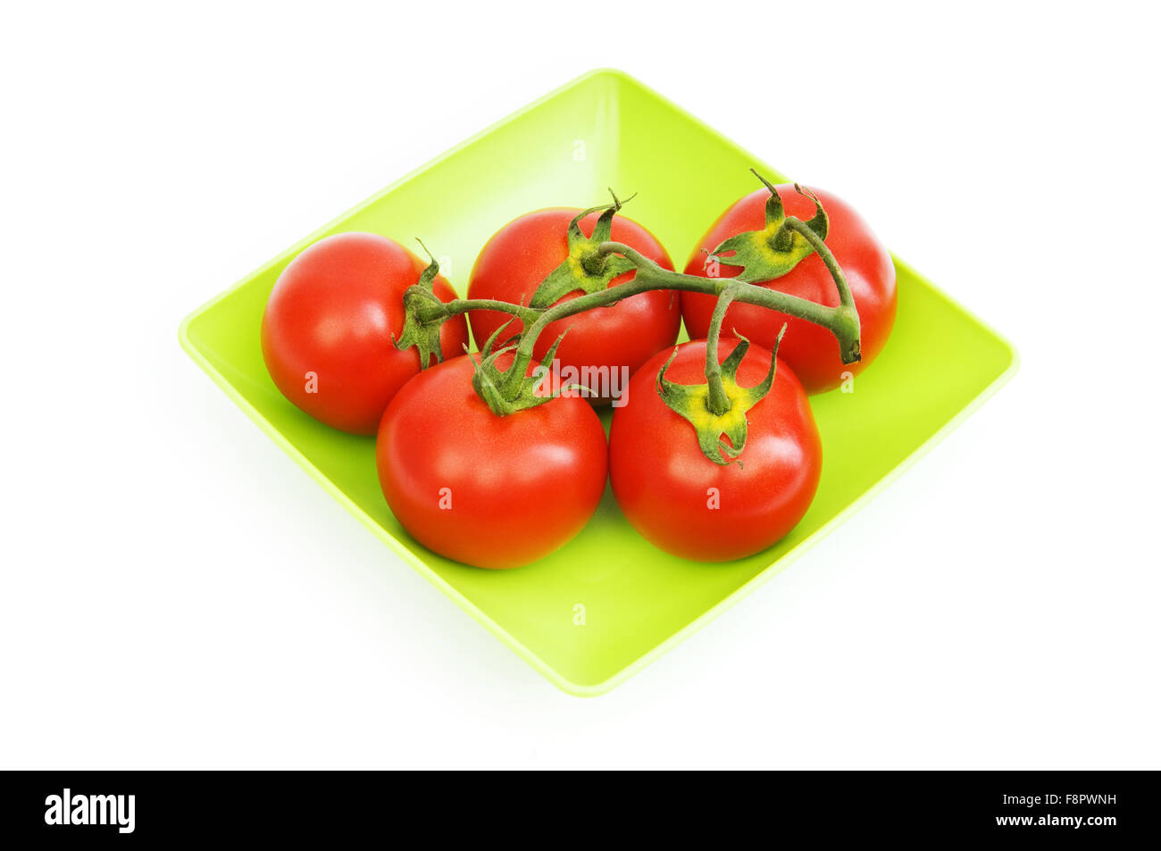 Red tomatoes isolated on the white background Stock Photo - Alamy