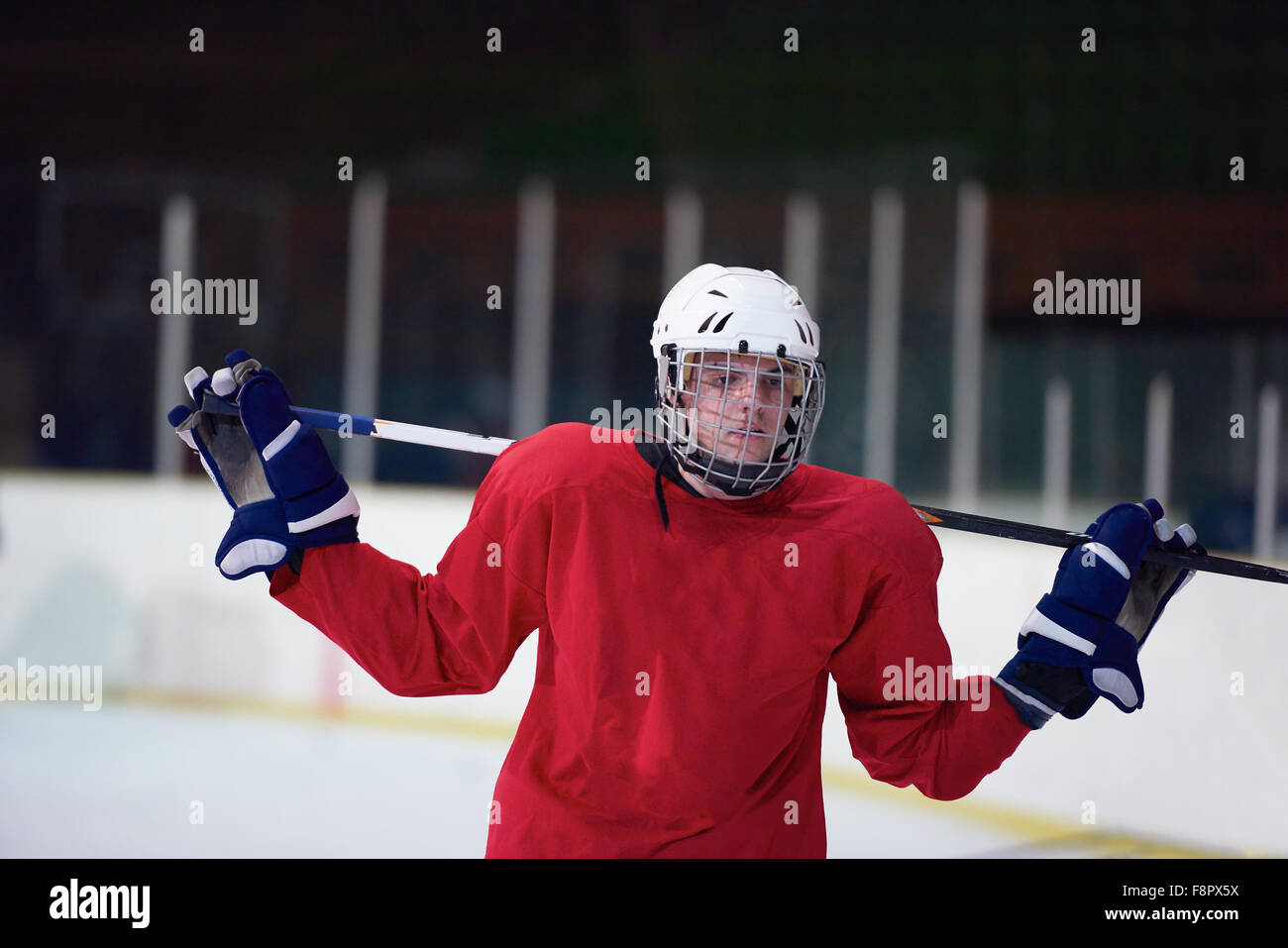 young ice hockey player portrait on training in black background Stock Photo Alamy