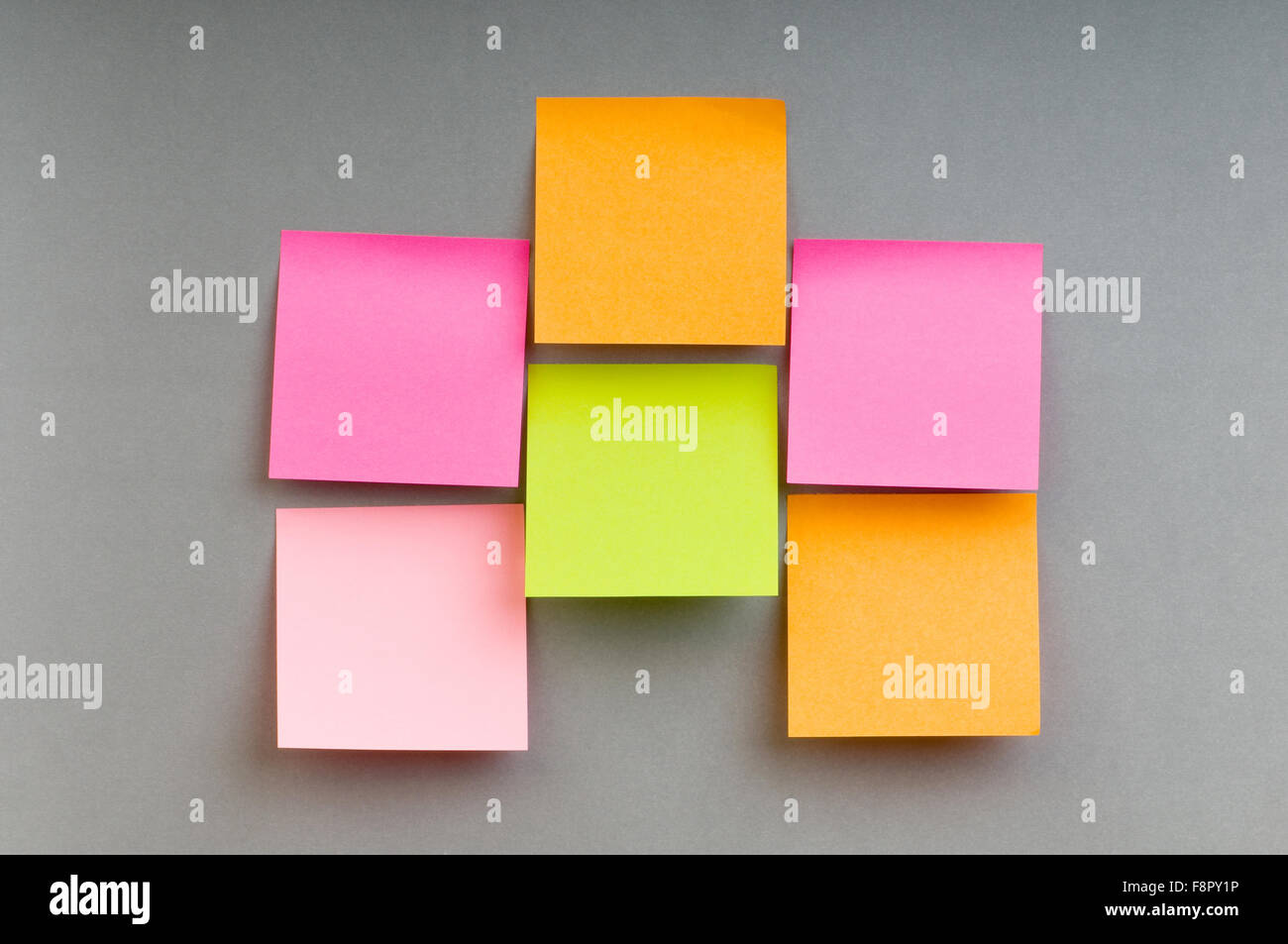 Reminder notes on the bright colorful paper Stock Photo - Alamy