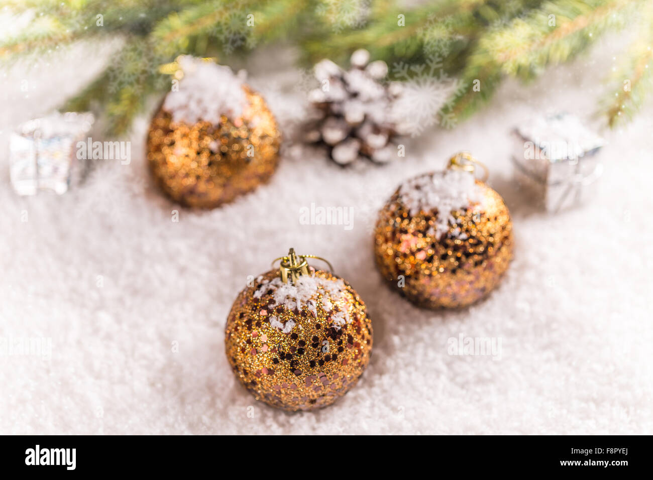 Glitter Christmas ball in snow, Christmas concept Stock Photo