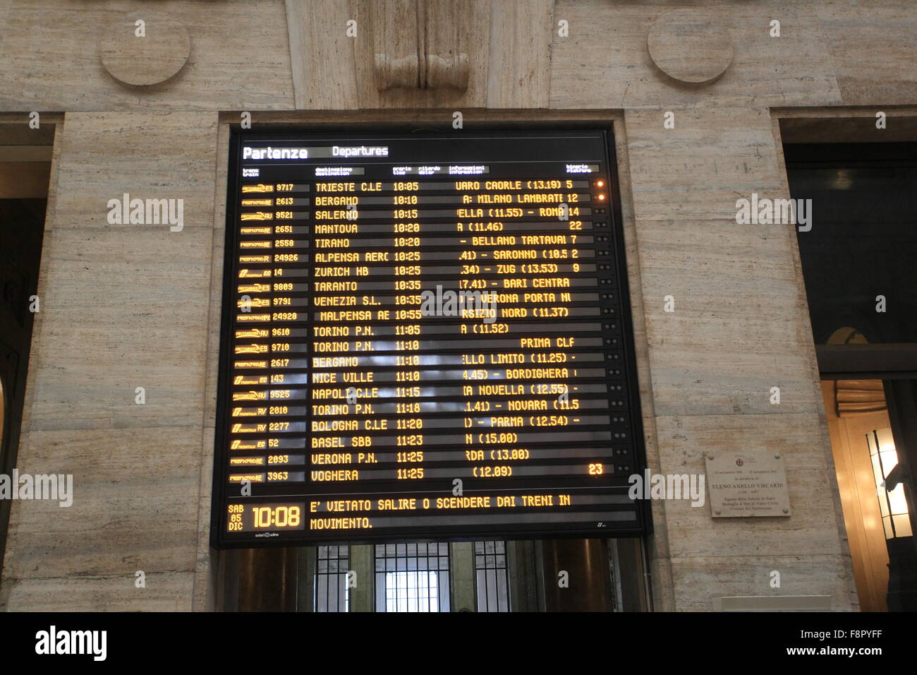 Milan railway station train departure board Stock Photo