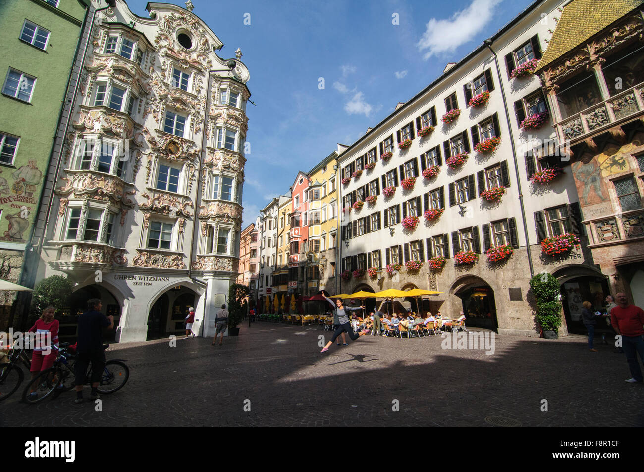 Jump Shot at the Helblinghaus (Casa Helbling), a Baroque and Gothic building in Innsbruck, Austria Stock Photo