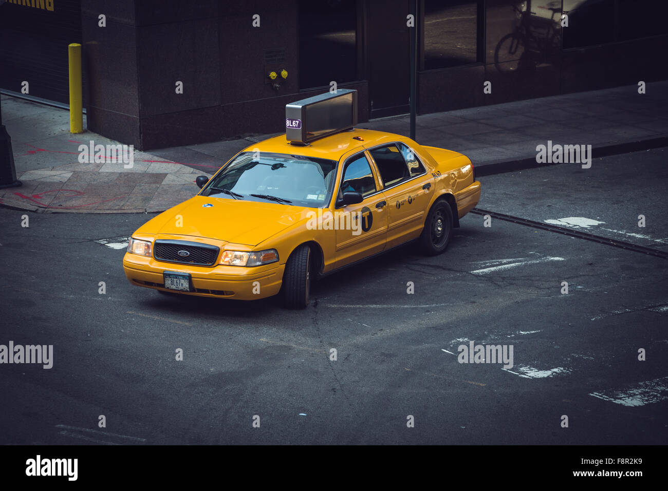 New York City - September 19: Manhattan Yellow Cab and makes turning at left on 19 September 2015. Stock Photo