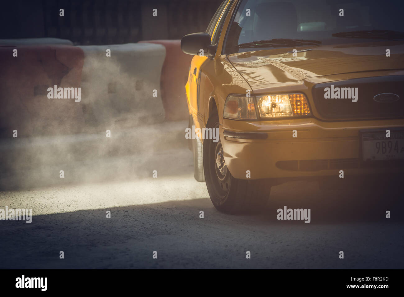 New York City - September 19: Manhattan Yellow Cab and makes turning dusty on 19 September 2015. Stock Photo