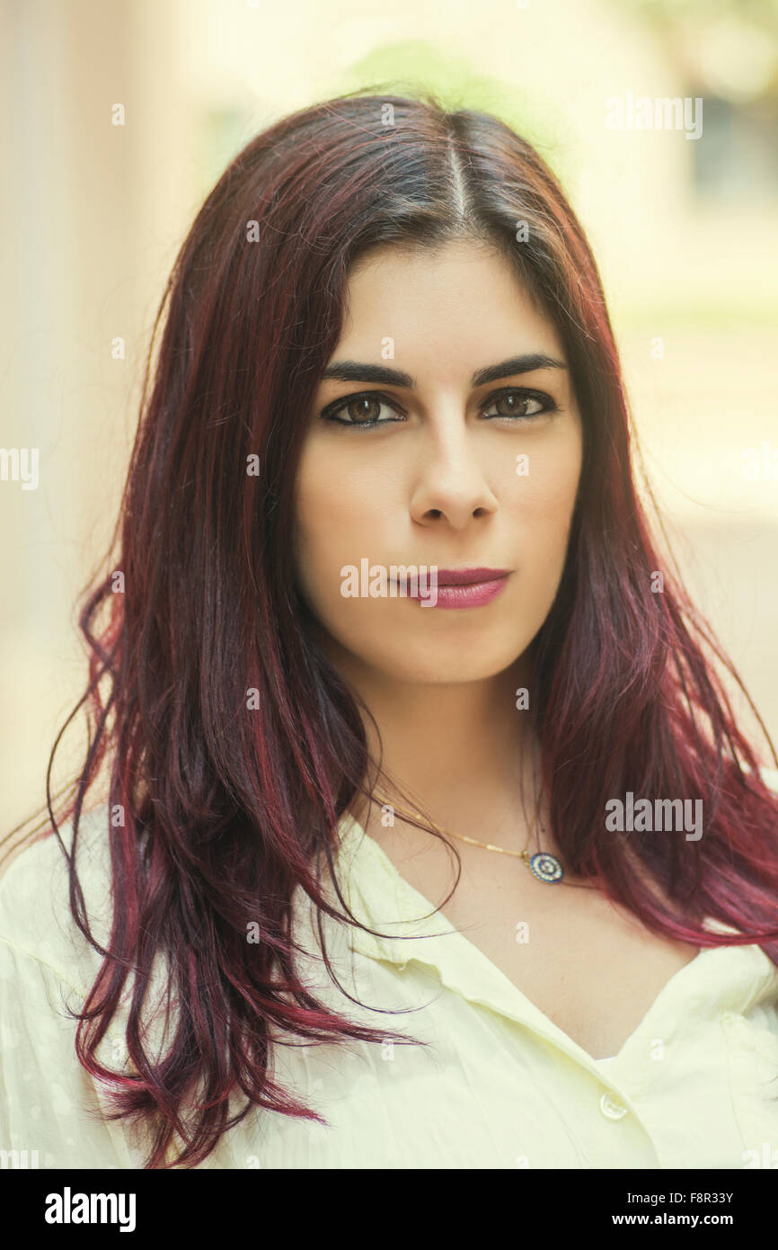 Head and shoulders portrait of a young woman outdoors Stock Photo - Alamy
