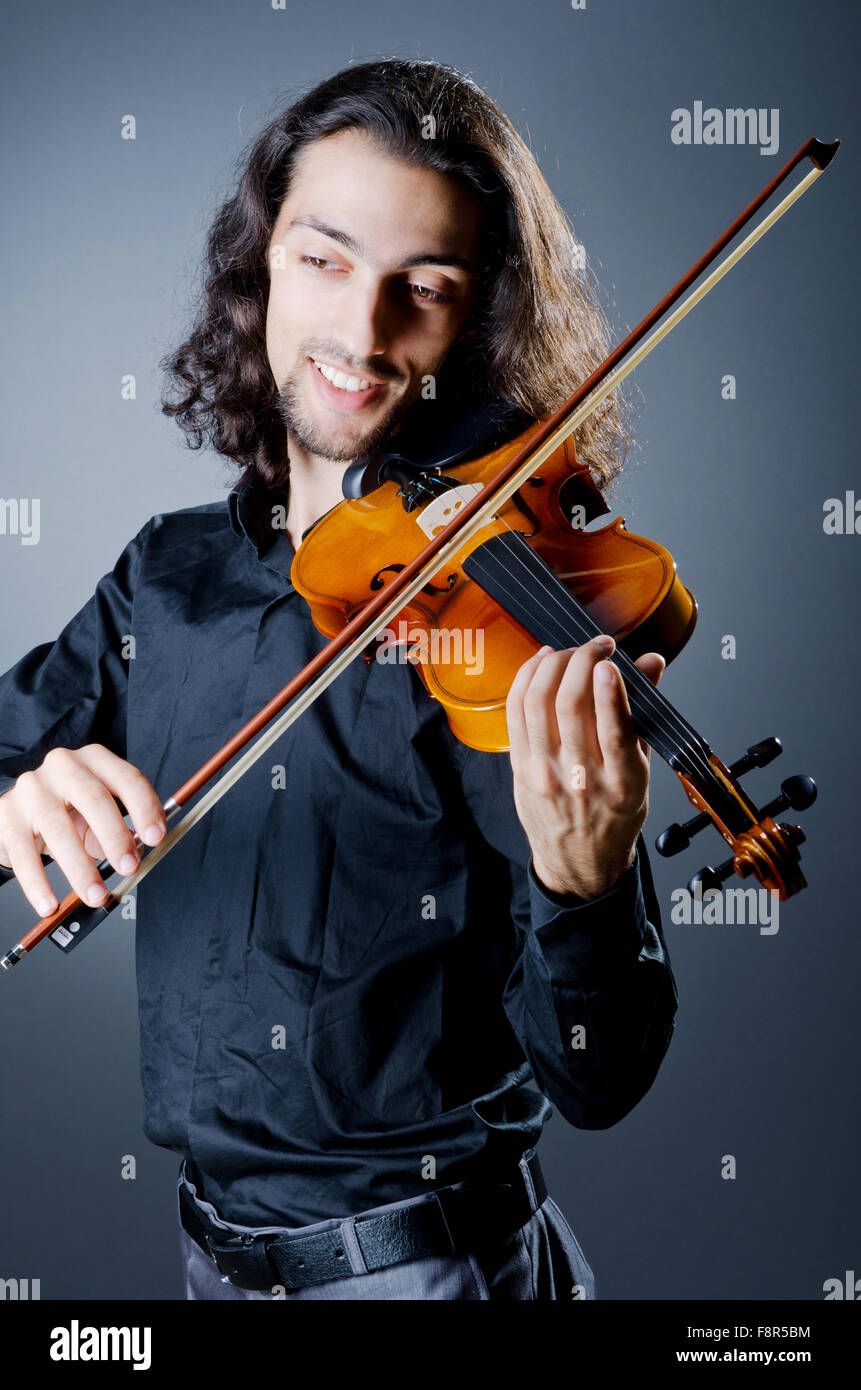 Violin player playing the intstrument Stock Photo Alamy