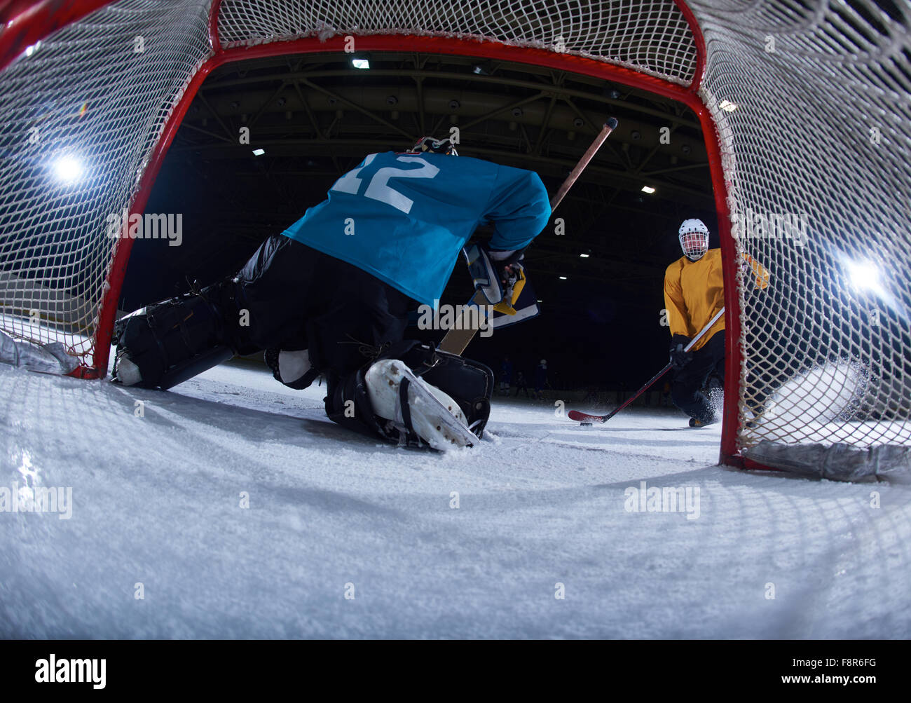 ice hockey goalkeeper player on goal in action Stock Photo Alamy