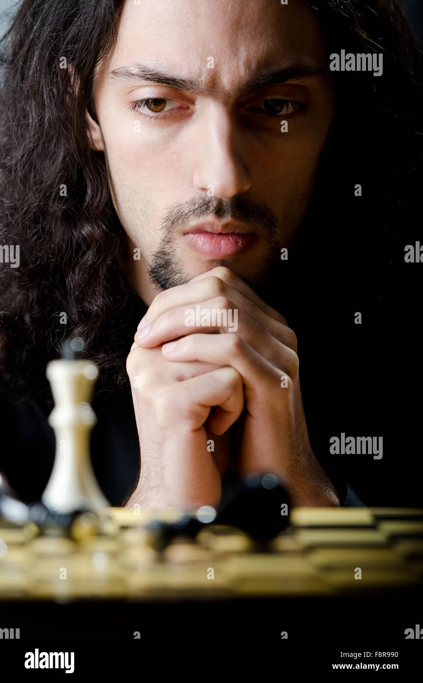 Chess player playing his game Stock