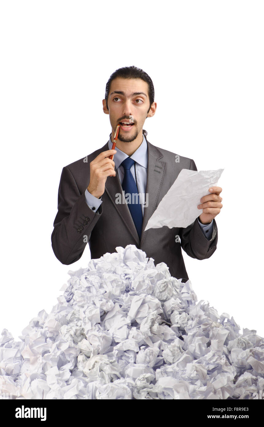 Man with lots of waste paper Stock Photo - Alamy