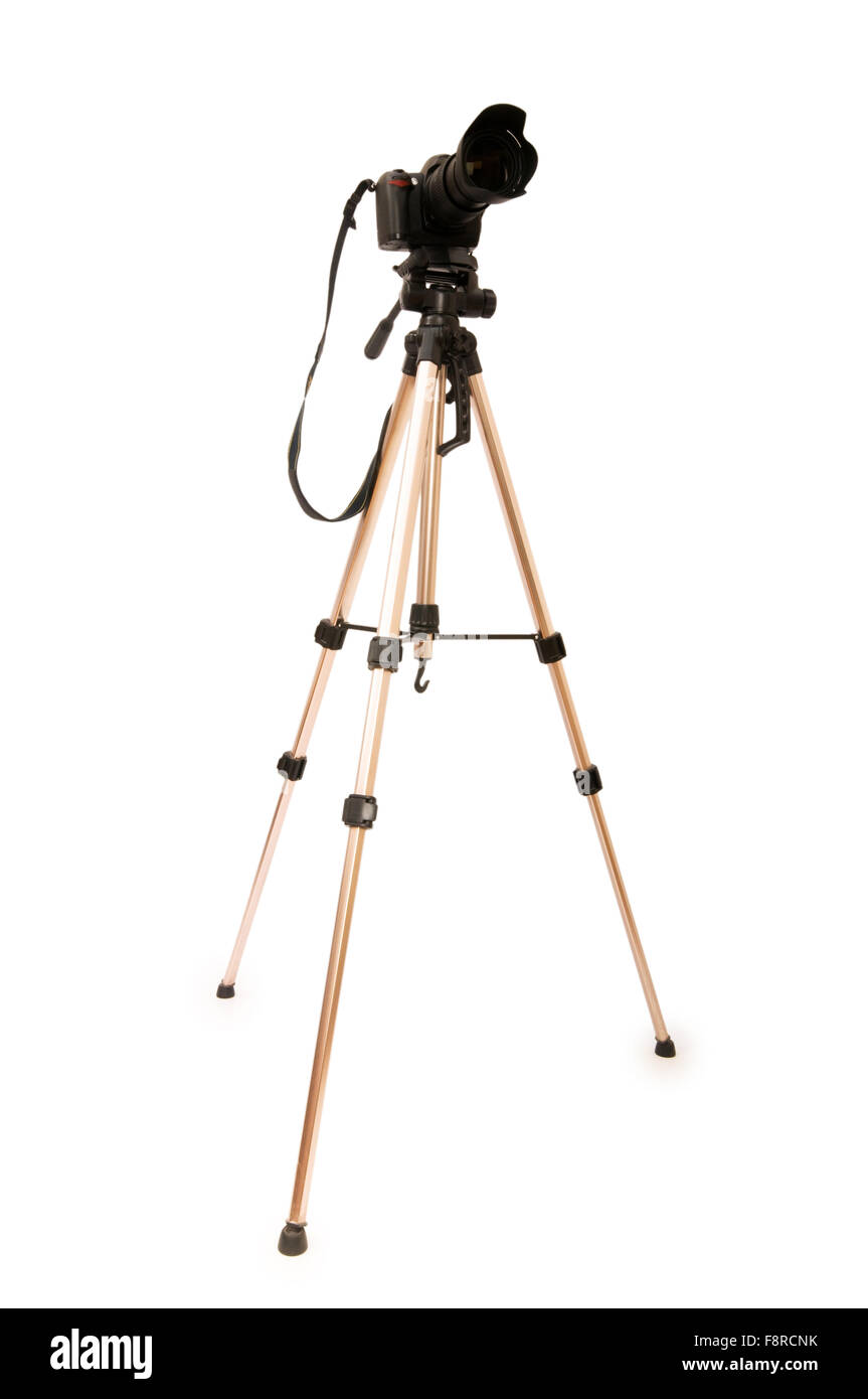 Tripod and camera isolated on the white background Stock Photo - Alamy