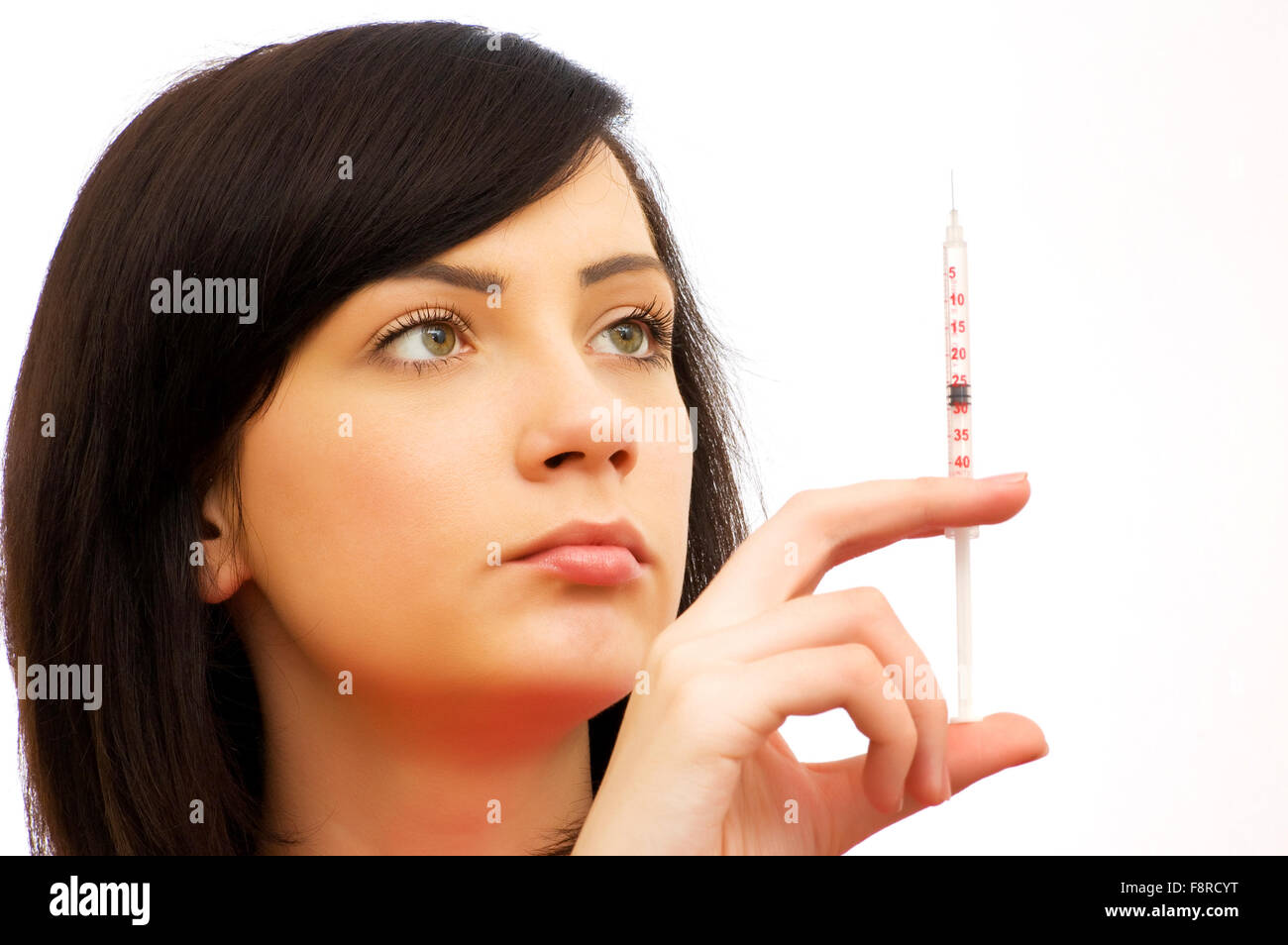 Syringe Check Woman checking syringe isolated on the white Stock Photo - Alamy