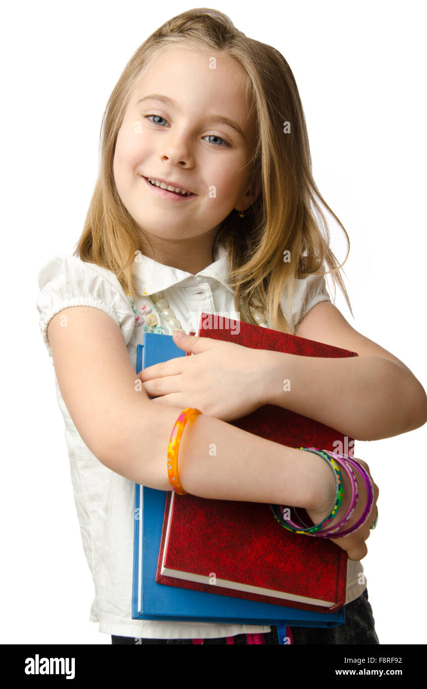 Little girl with books on white Stock Photo - Alamy