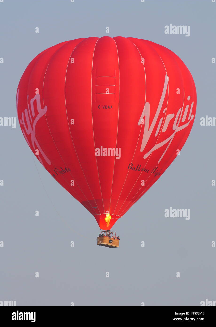 Virgin Balloon taking off from a field in Henley on Thames, Oxfordshire, UK Stock Photo