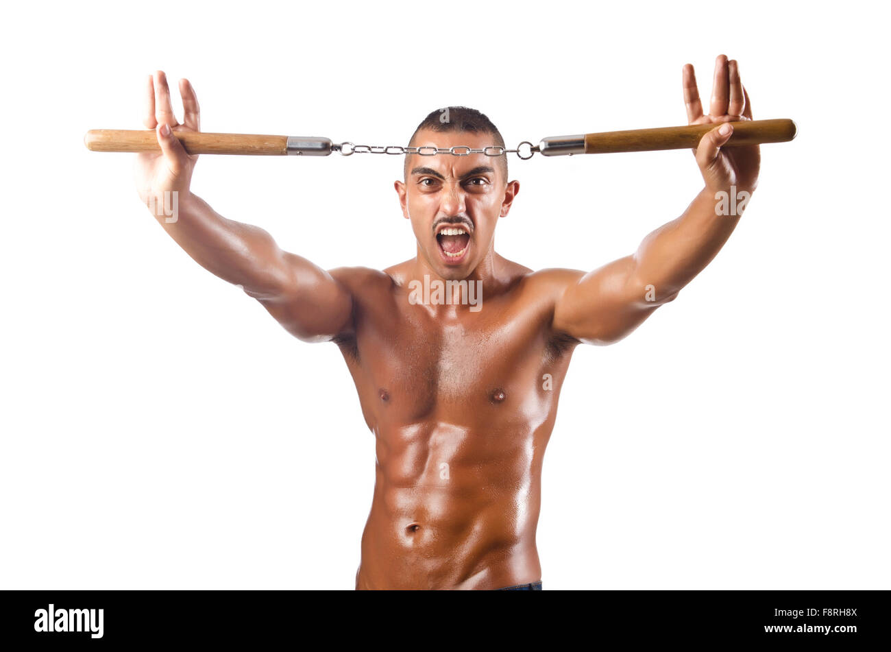 Man in martial arts concept with nunchucks Stock Photo Alamy