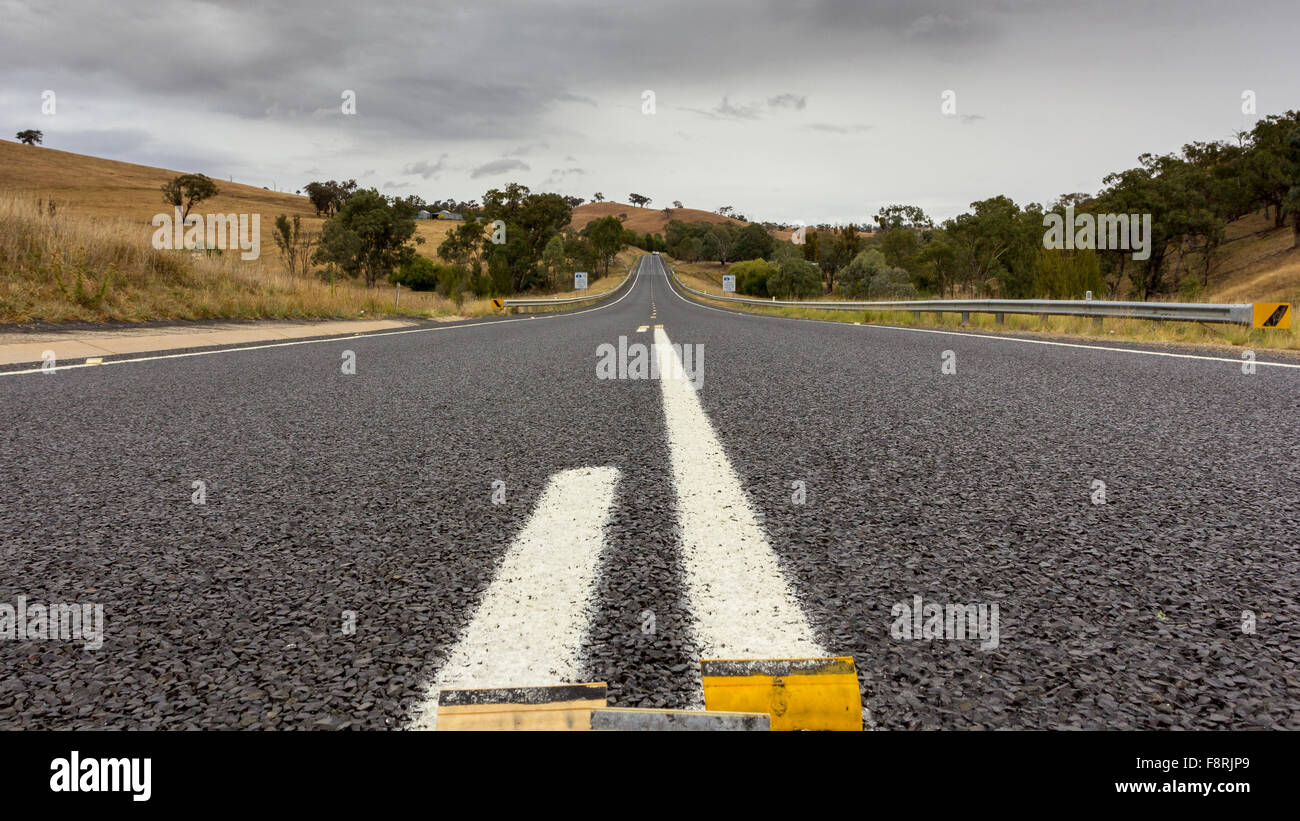 Empty straight road, Lyndhurst, New South Wales, Australia Stock Photo