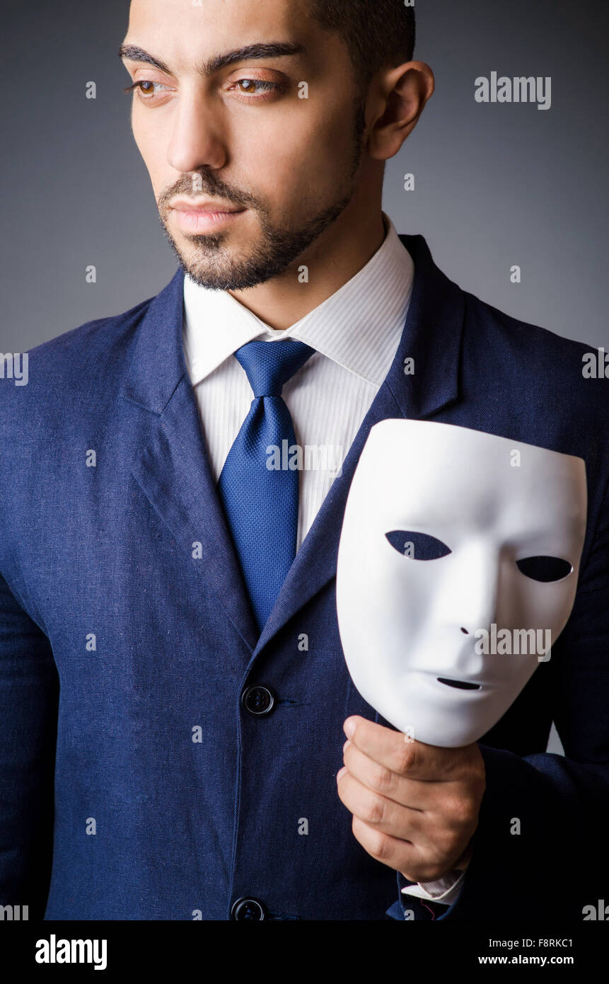 Man with black mask in studio Stock Photo Alamy