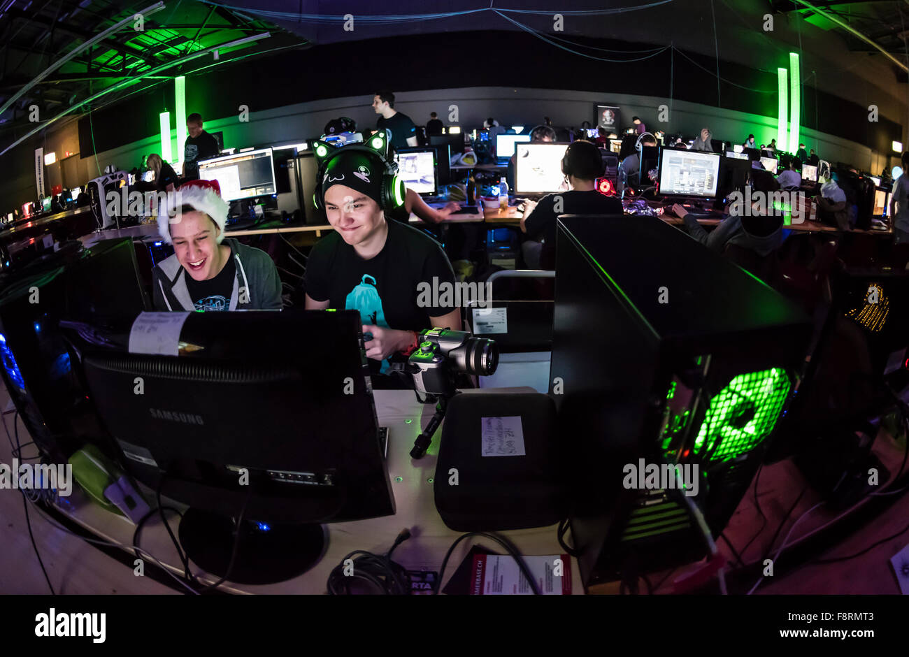 Thun, Switzerland. 10th Dec, 2015. Computer game enthusiasts play at NetGame, Switzerland's largest computer game convention at Thun's expo centre. For 3 days and nights, competing fans and clans play tournaments in CS:GO, Age of Empires and many more. Credit:  Erik Tham/Alamy Live News Stock Photo
