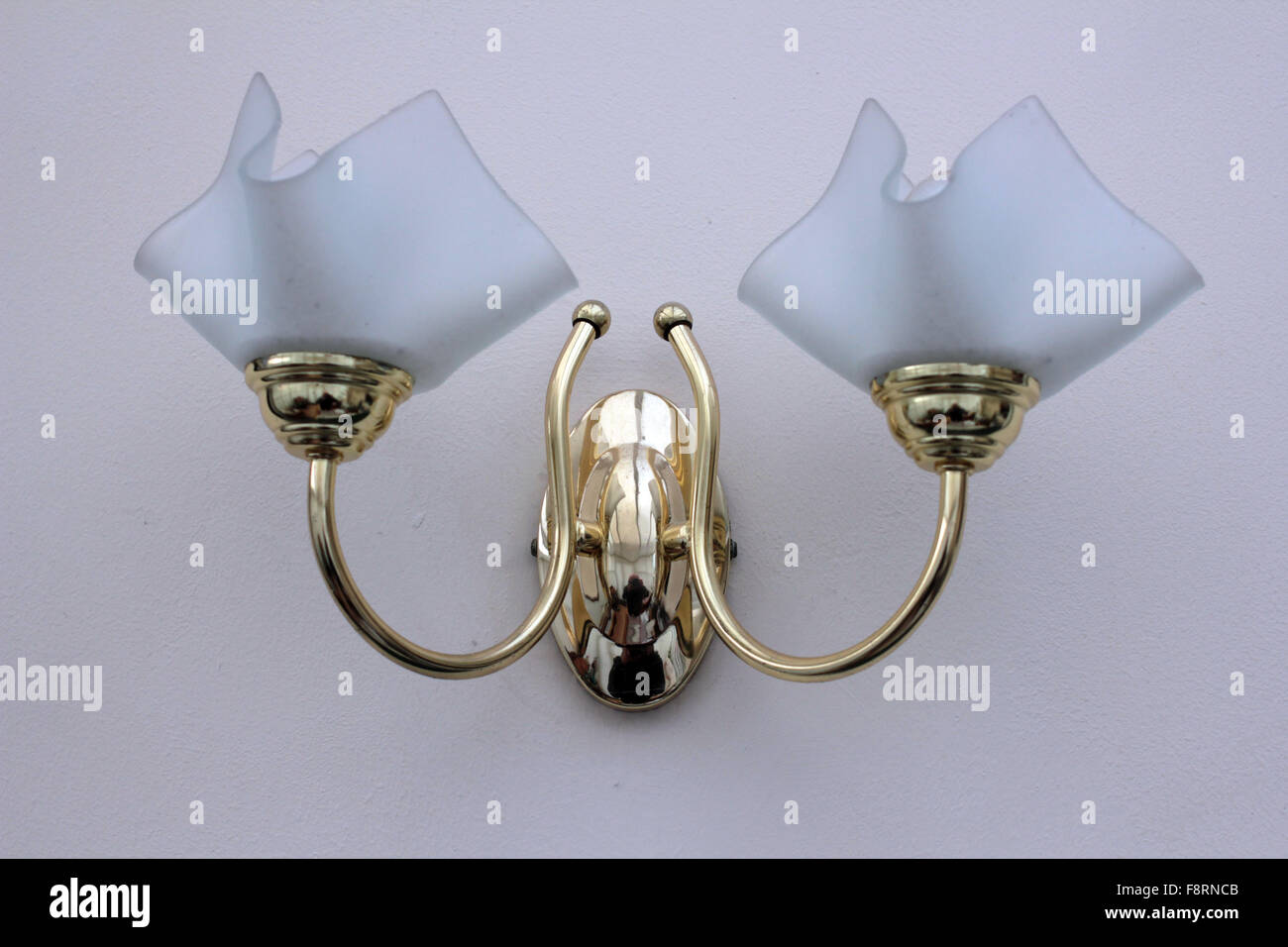 Ornate light fitting with glass shades Stock Photo Alamy