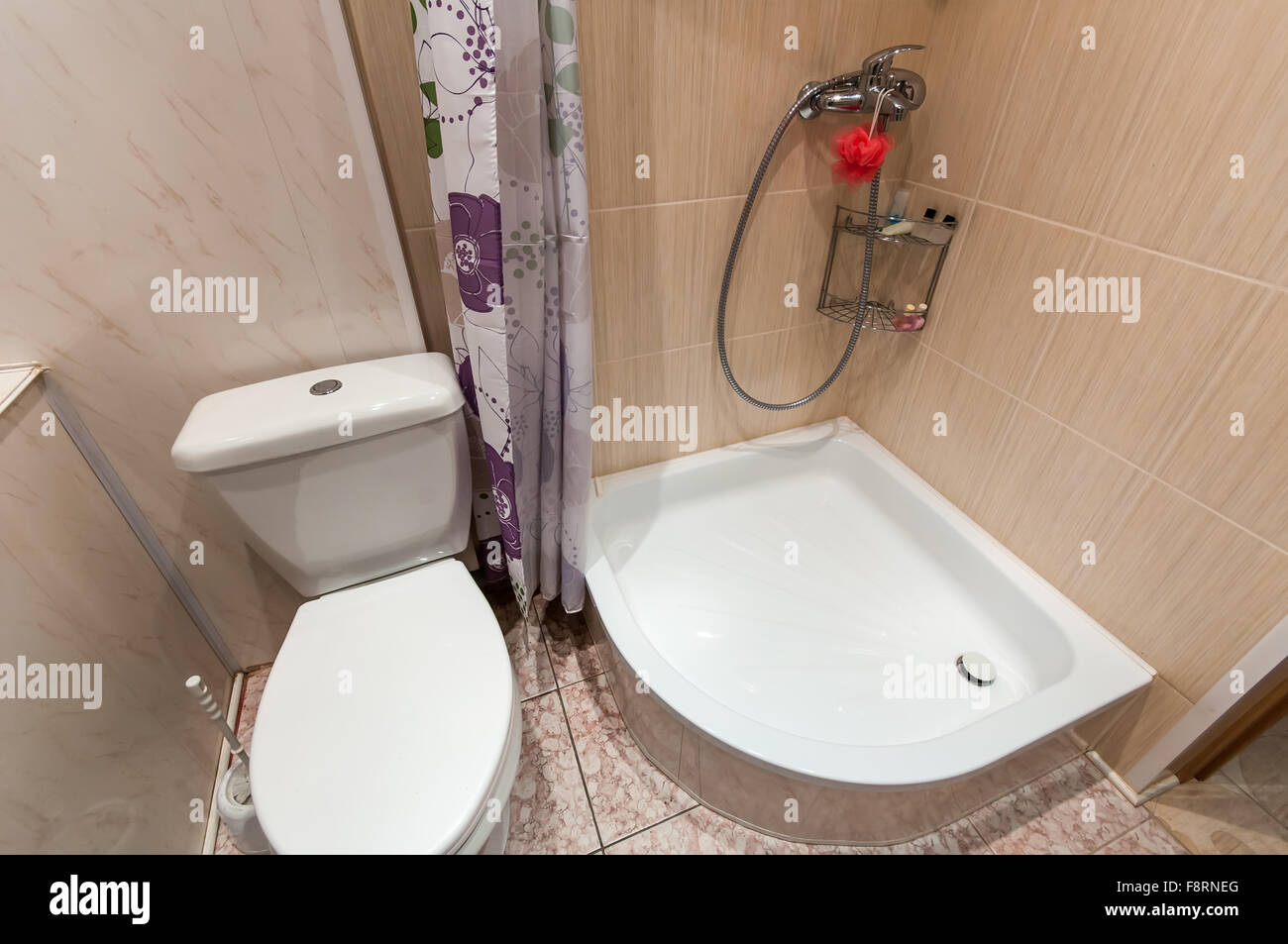 combined bathroom with sink toilet and shower tray Stock Photo