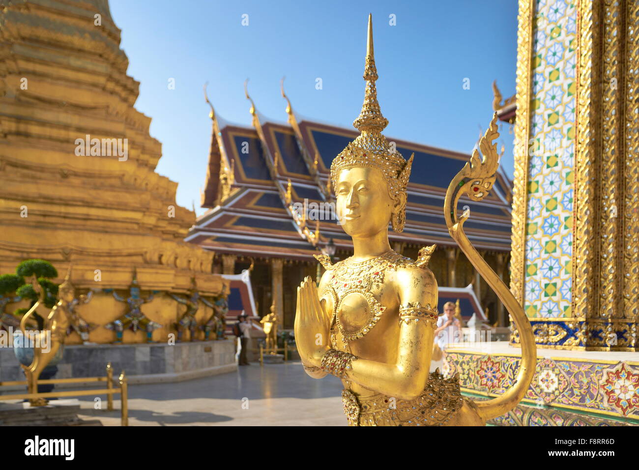 Thailand - Bangkok, Wat Phra Kaeo Temple, Grand Palace, Kinaree statue in front of the Royal Panteon Stock Photo