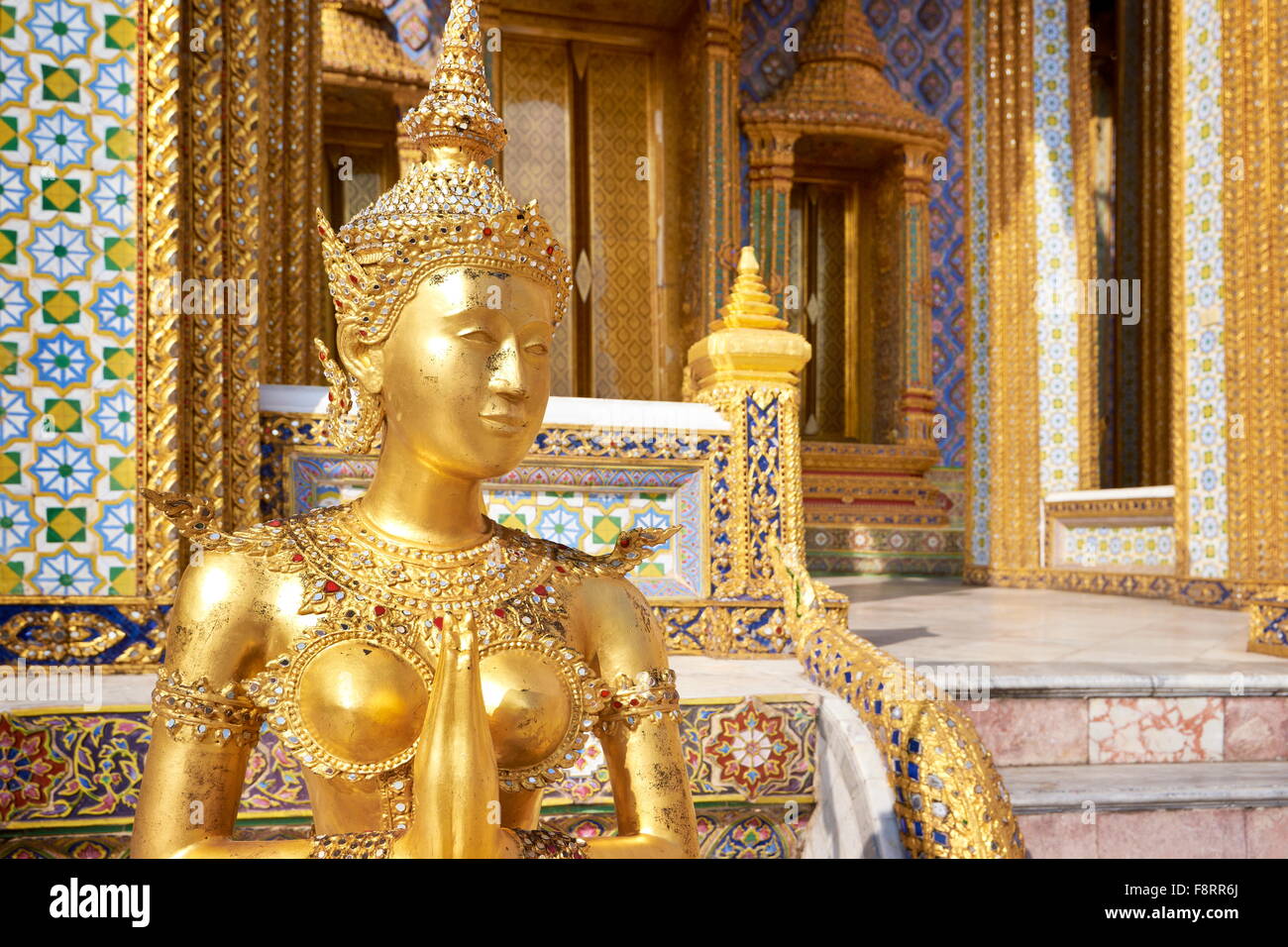 Thailand - Bangkok, Wat Phra Kaeo Temple, Grand Palace, Kinaree statue in front of the Royal Panteon Stock Photo