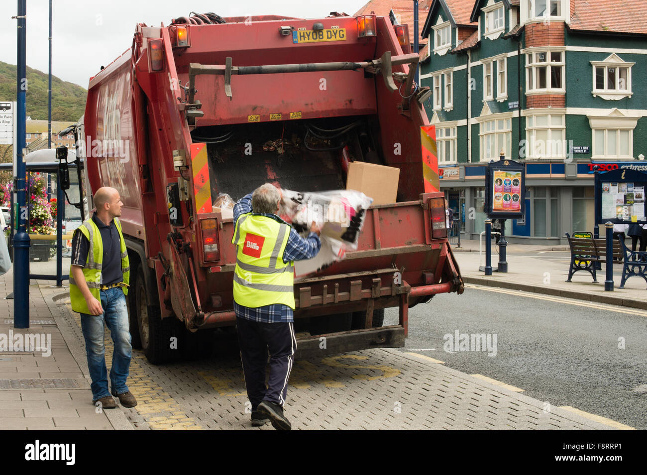 BIFFA commercial waste rubbish collection lorry truck being loaded