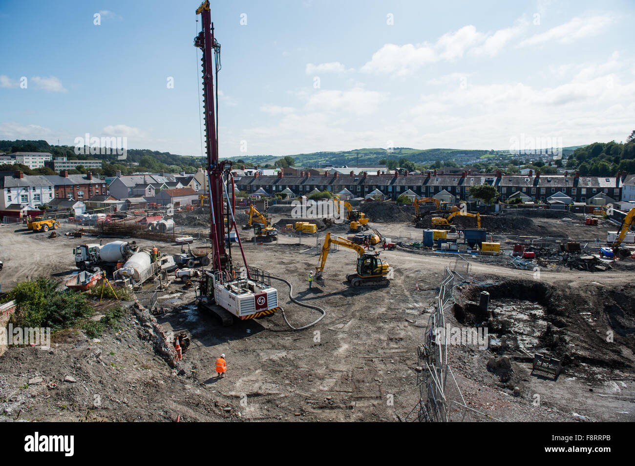 Urban Regeneration: Work prgressing to lay the foundations for a new branch of Marks and Spencers and a Tesco supermarket , on the brownfield former council yard site, Mill Street, Aberystwyth Wales UK, September 2015 Stock Photo