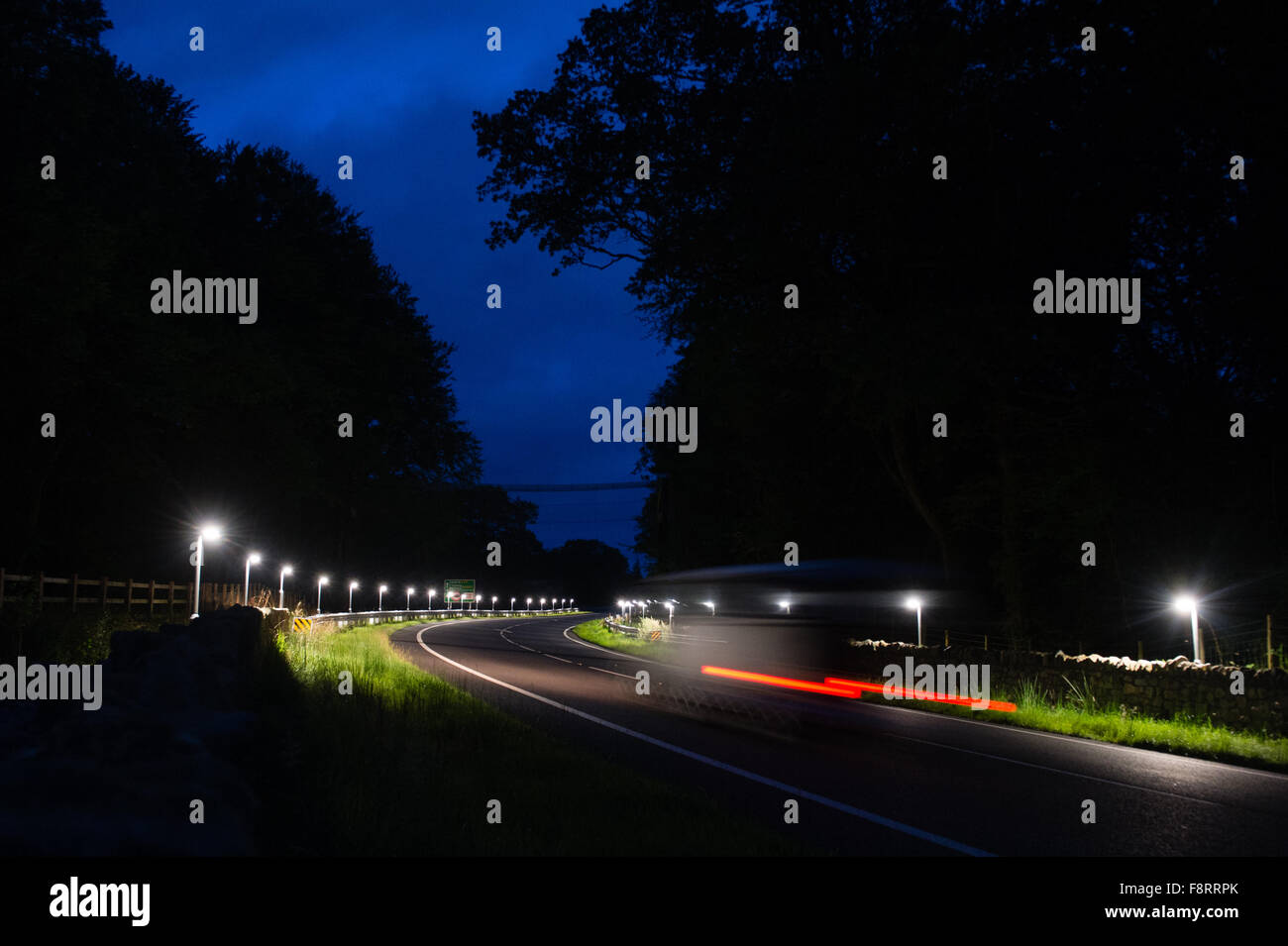 'Batlights' on the A470 trunk road near Dolgellau Gwynedd North Wales, designed to deter bats from flying low into the path of oncoming traffic on  stretch of new road that bisects one of their traditional flight paths through old deciduous oak woodland. Stock Photo