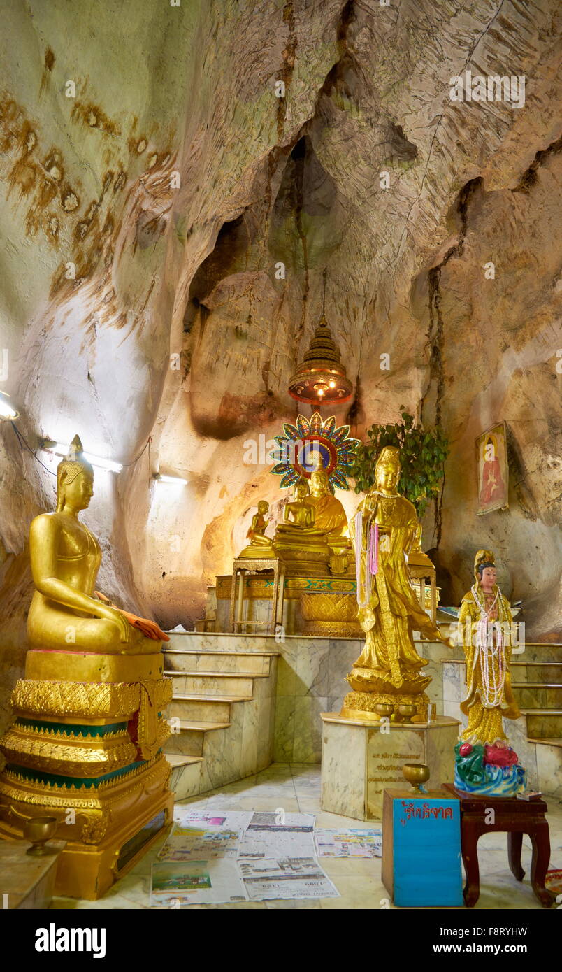 Thailand - Khao Yoi Buddhist Cave Temple, Buddha statues inside Stock Photo