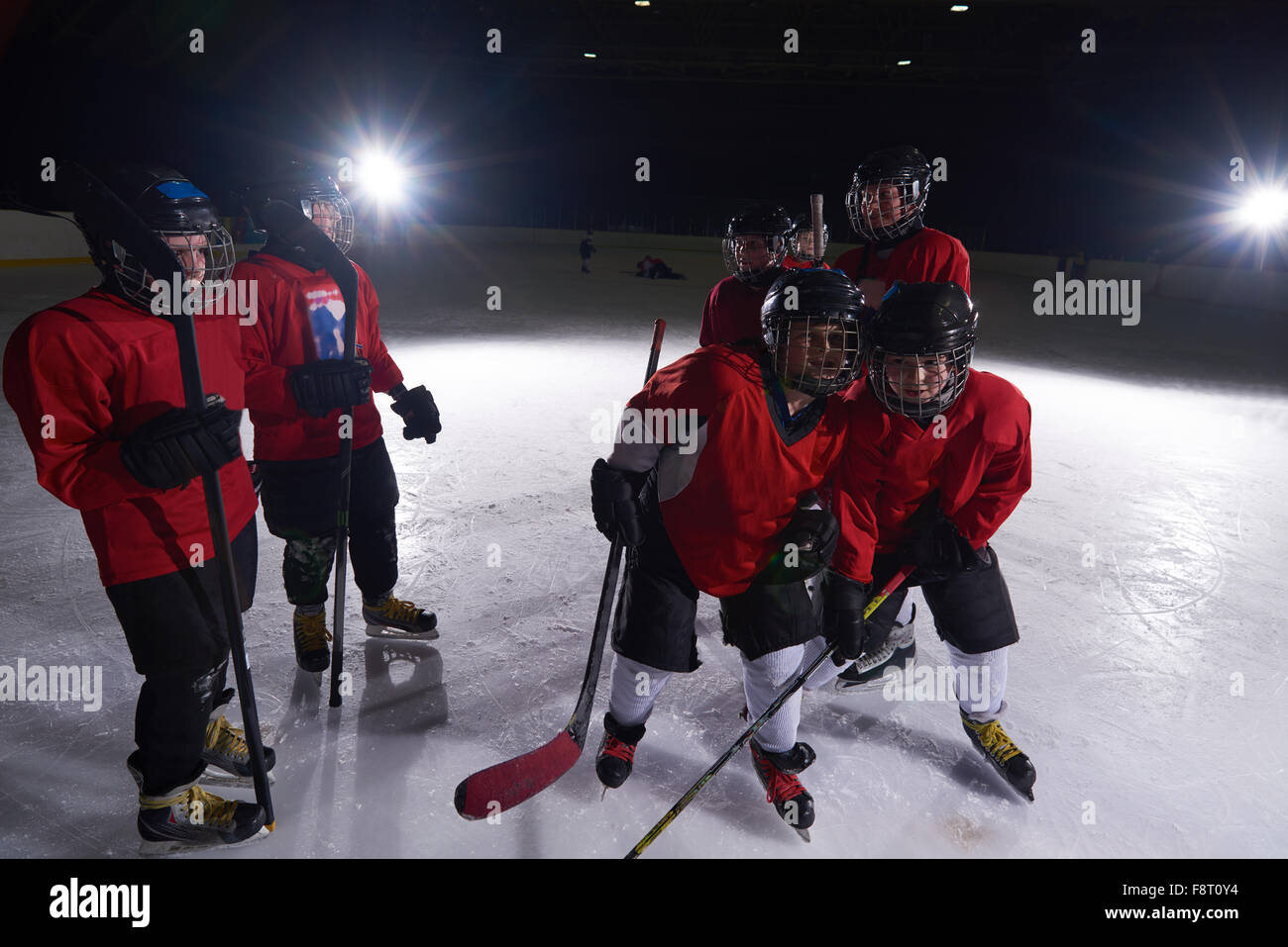 happy children group  ice hockey team  sport players portrait Stock Photo