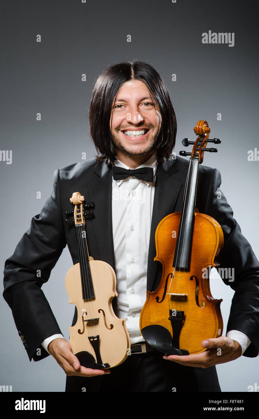 Man violin player in musican concept Stock Photo Alamy