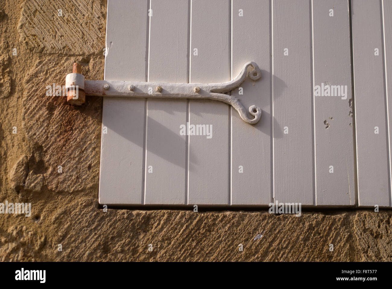 Ornate shutter hinge, Domme, France Stock Photo Alamy