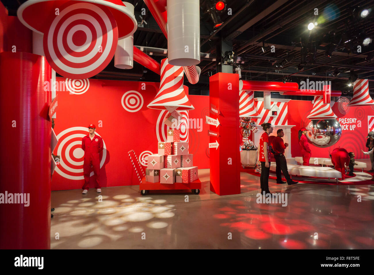 Visitors to the Target 'Wonderland!' pop-up store in the Meatpacking District in New York on its grand opening day, Wednesday, December 9, 2015. According to Target the store combines physical and digital shopping using medallions given to visitors with an embedded RFID chip. Tapping the chip to an antenna near the product lets you order it. The store is an experiment in technology replacing shopping carts with chips.  (© Richard B. Levine) Stock Photo