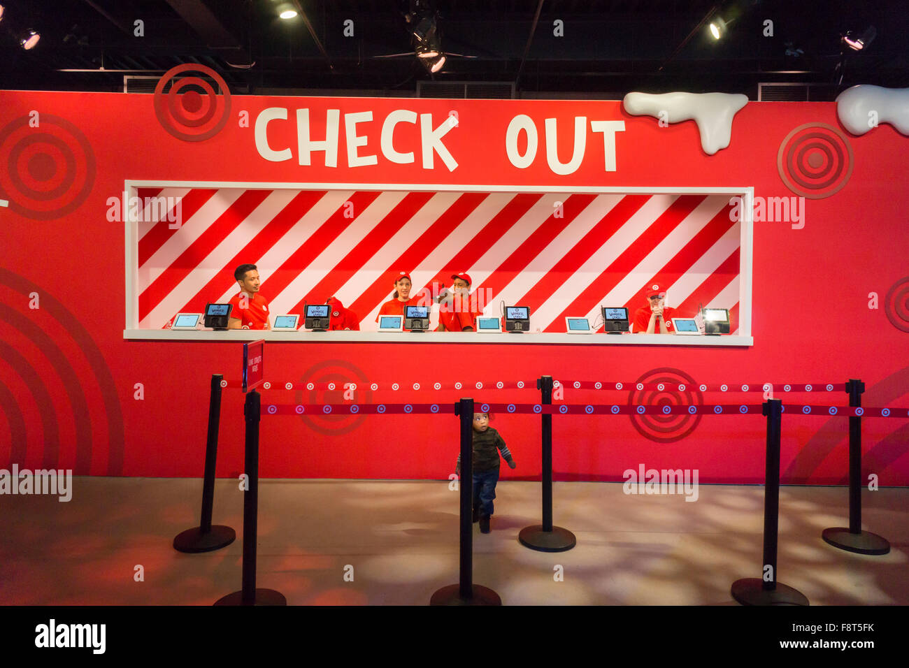 Workers in the checkout in the Target "Wonderland!" popup store in
