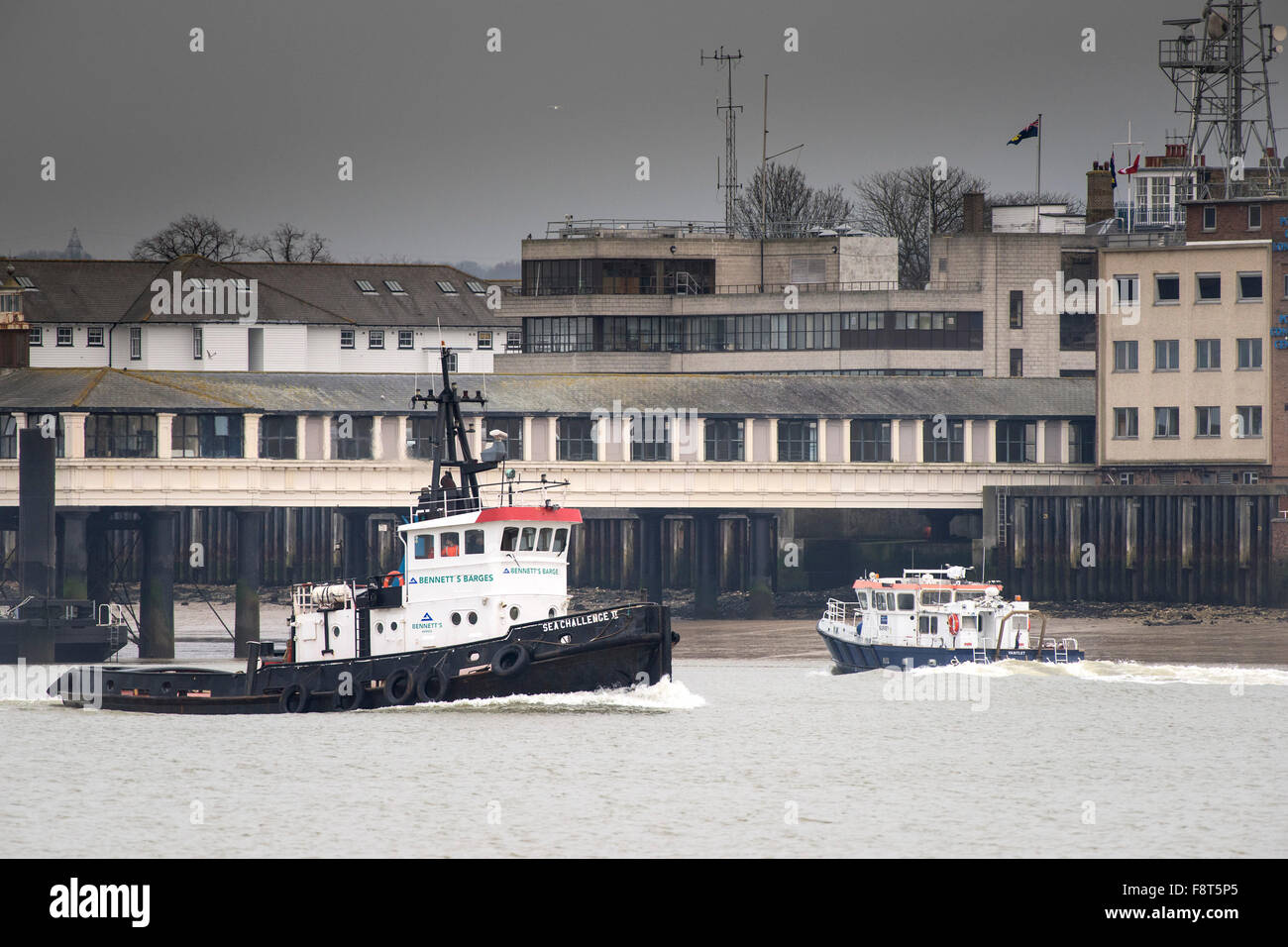 The tug, Sea Challenge II passes Gravesend as she steams upriver on the River Thames. Stock Photo