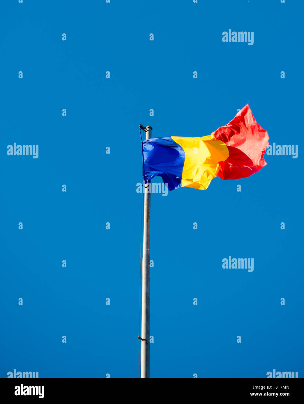 Flag of Romania in a sunny day Stock Photo