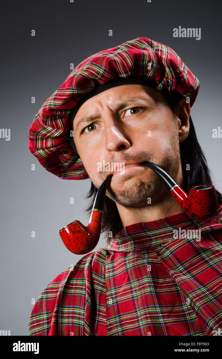 Funny scotsman with smoking pipe Stock Photo Alamy