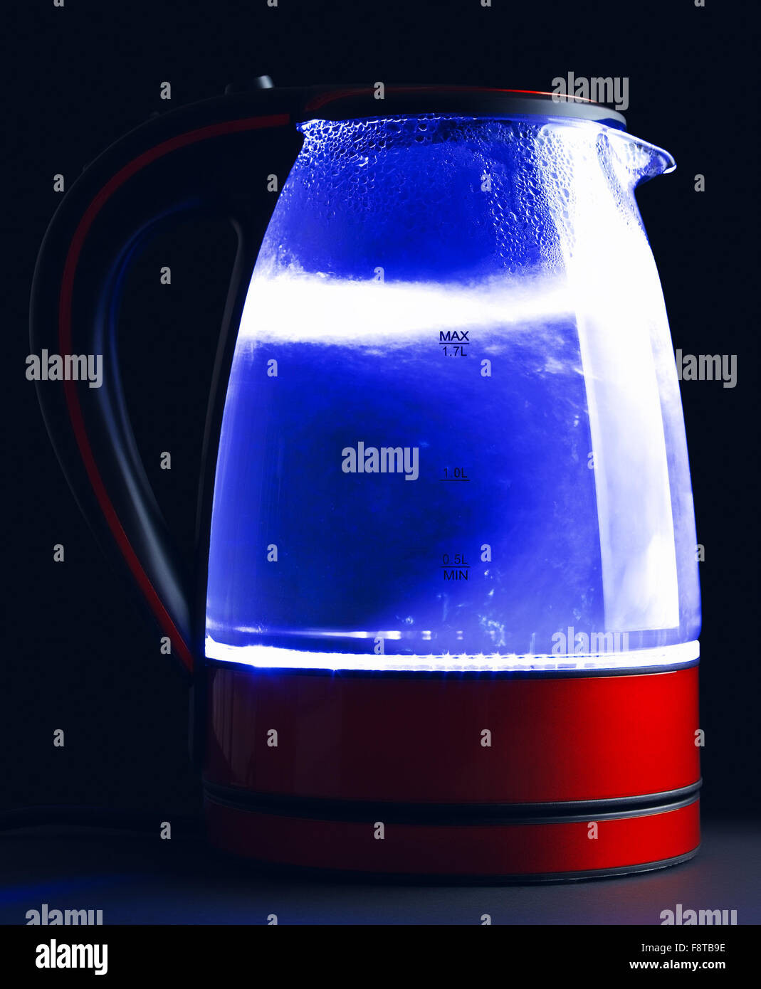 https://c8.alamy.com/comp/F8TB9E/glass-electric-kettle-with-boiling-water-black-background-F8TB9E.jpg