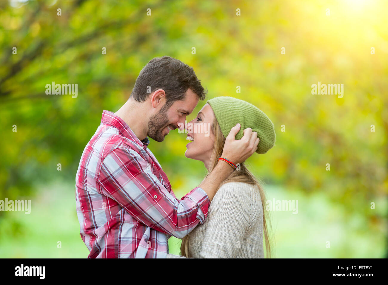 Young couple dating in forest Stock Photo