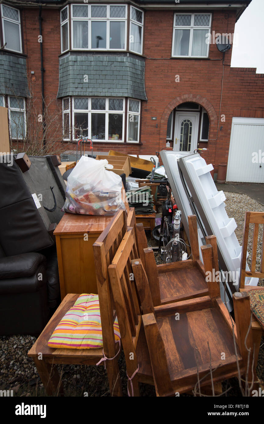 Furniture and other households goods damaged by flooding in Carlisle at the beginning of December, 2015. Record rain fall in Cumbria caused flooding to several areas of Carlisle, causing houses to be evacuated by emergency services. Stock Photo