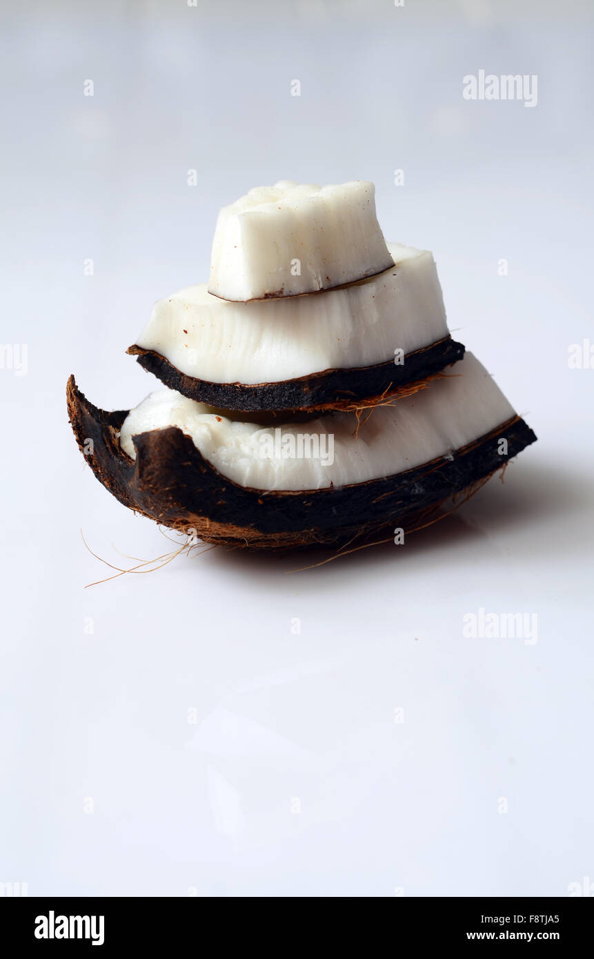 close up of coconut pieces on  white background Stock Photo