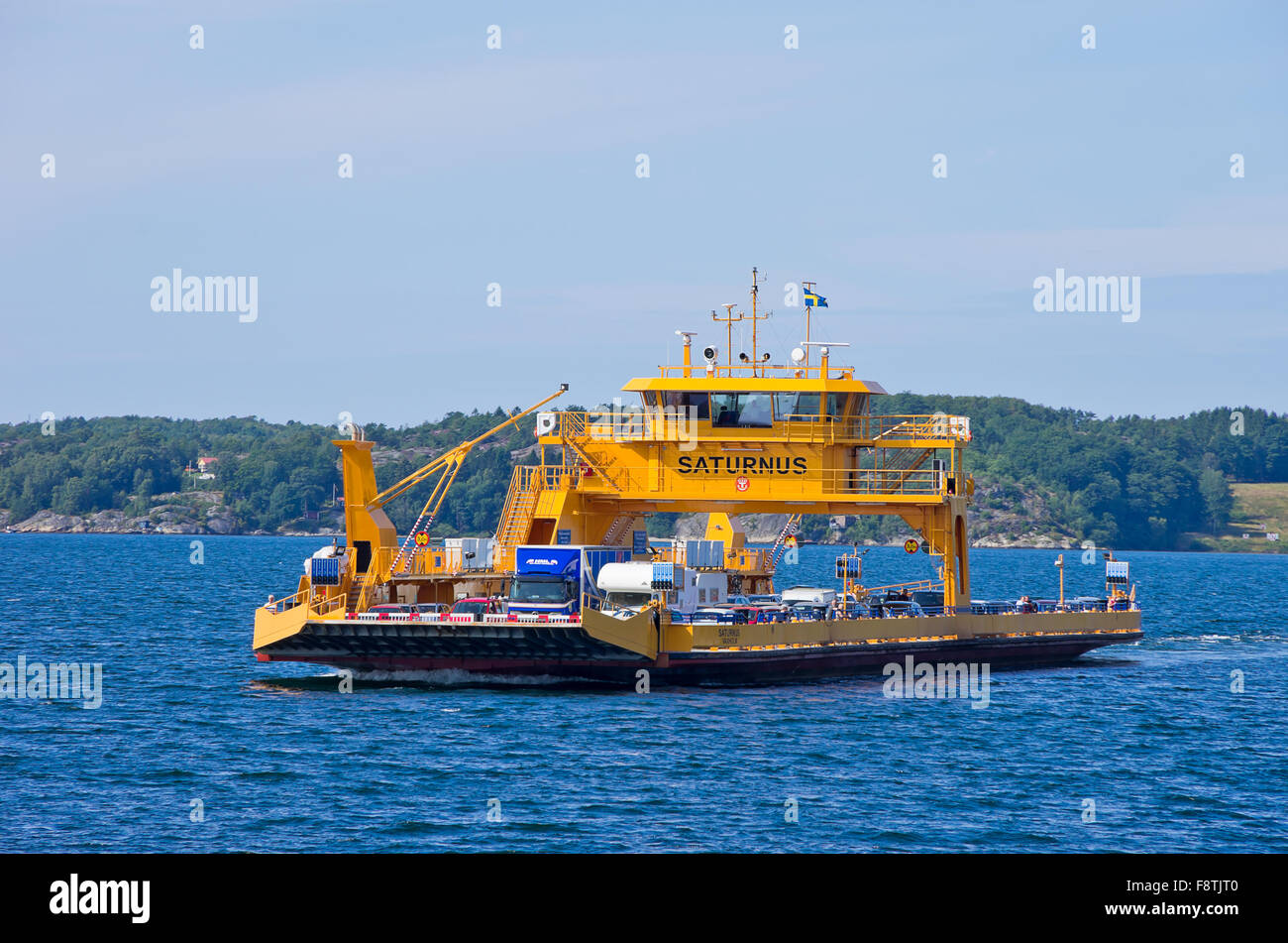 ROAD FERRYBOAT DRIVES PAST Stock Photo