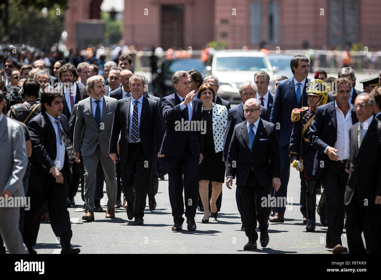 Buenos Aires, Argentina. 11th Dec, 2015. Argentina's President Mauricio Macri (C) walks on May Avenue with his Cabinet to participate in the Tedeum at the Metropolitan Cathedral in Buenos Aires, capital of Argentina, Dec. 11, 2015. According to local press, Mauricio Macri Friday attended the traditional religious service at the Metropolital Cathedral, one day after his pesidential inauguration. Credit:  Martin Zabala/Xinhua/Alamy Live News Stock Photo
